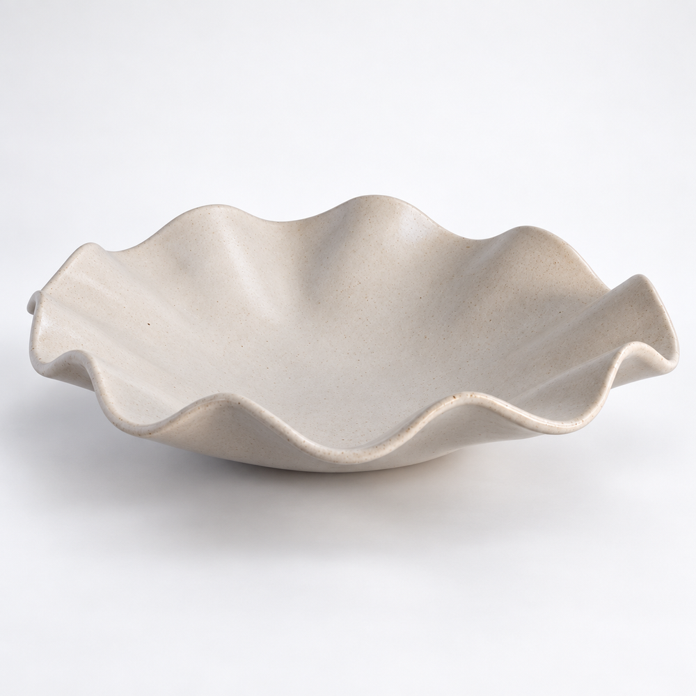 Ivory ceramic bowl with sculptural wavy rim